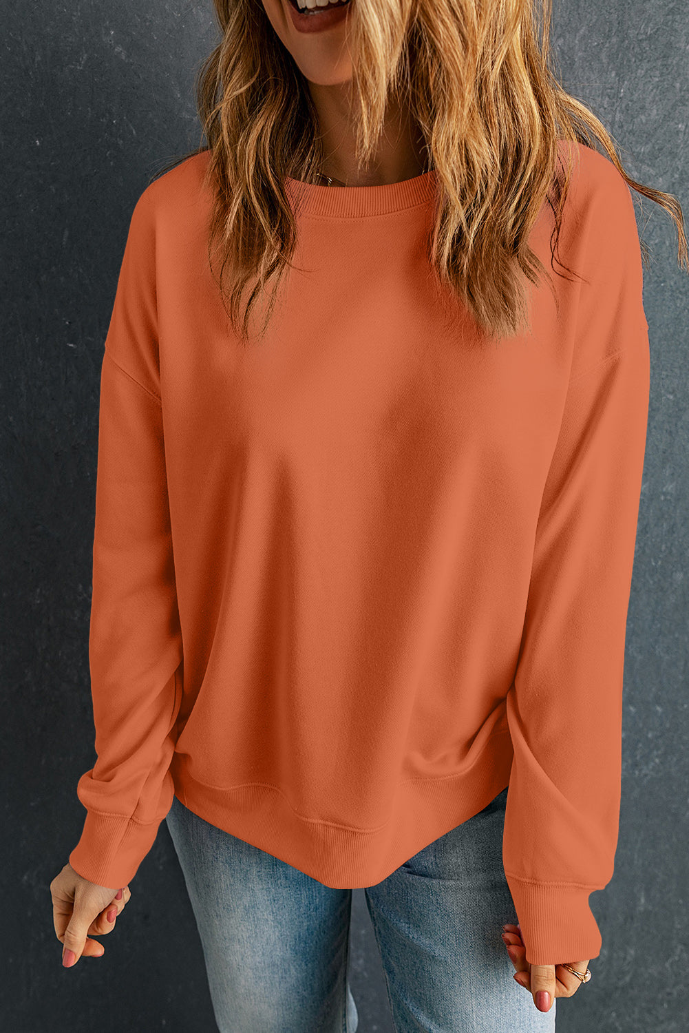 Orangefarbenes, klassisches Sweatshirt mit Rundhalsausschnitt