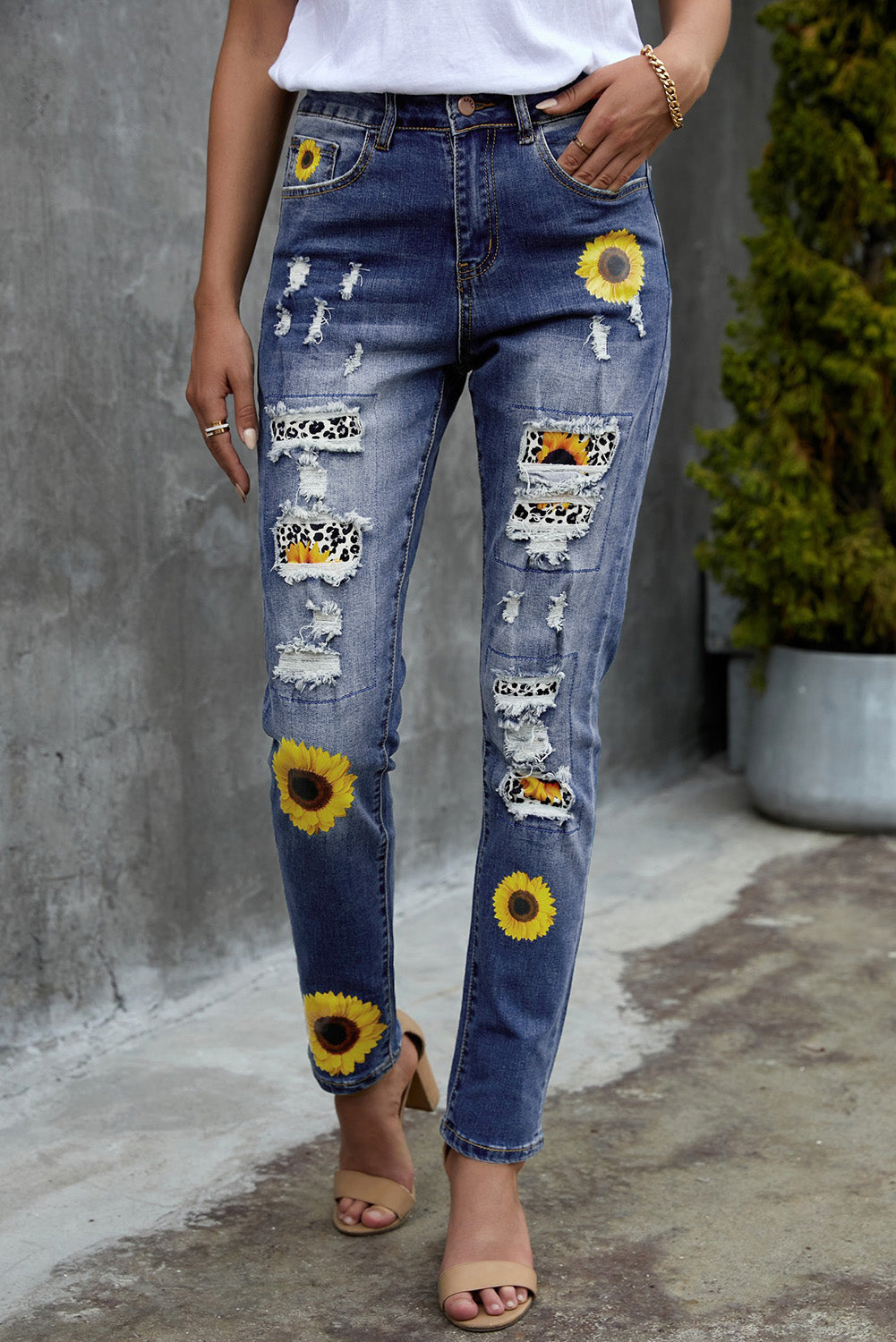 Jeans a vita alta invecchiati con stampa girasole patchwork leopardato