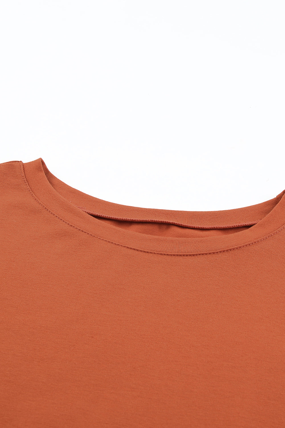 Oranžna bluza z okroglim izrezom z mehurčki