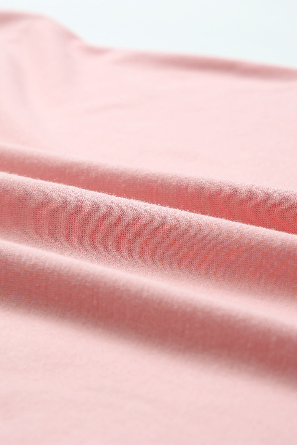 Rožnata majica s kratkimi rokavi in ​​barvnimi bloki z bleščicami