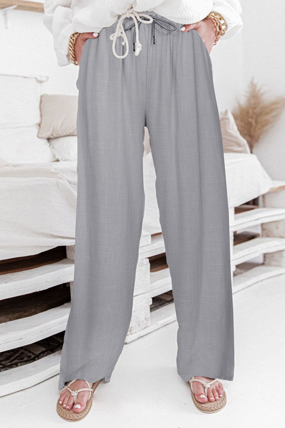 Pantaloni casual grigi a vita alta con coulisse e gambe larghe