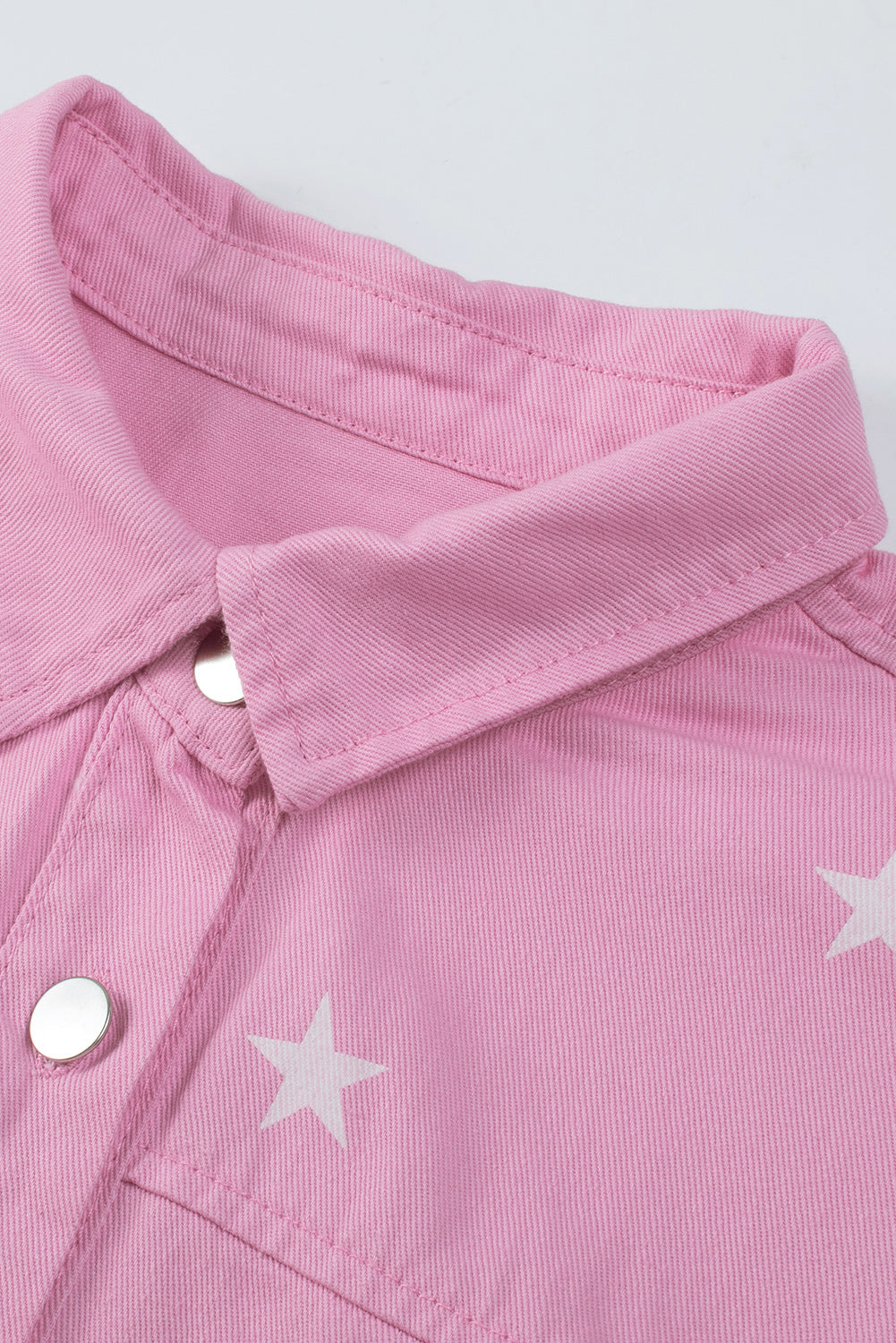 Veste en jean boutonnée rose à imprimé étoiles