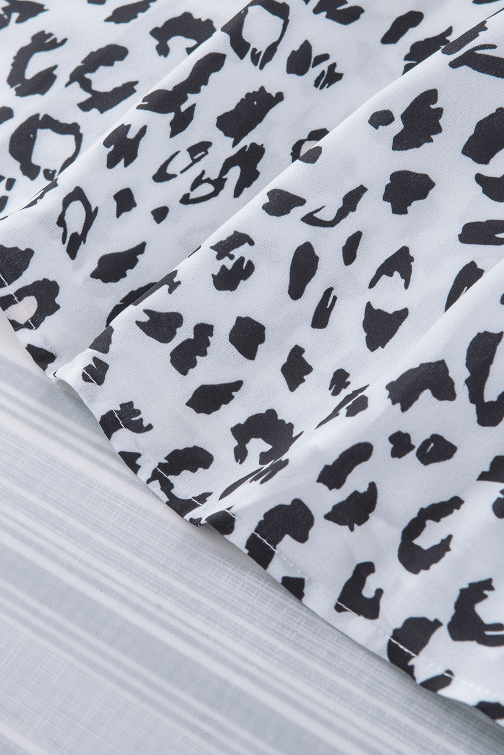 Leopard Mix Print Tassel Tie Blouse