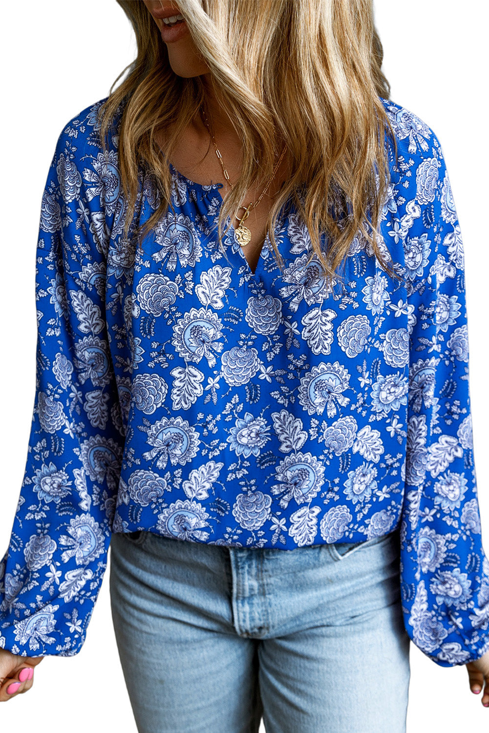 Modra bluza z dolgimi rokavi z v-izrezom in cvetličnim vzorcem