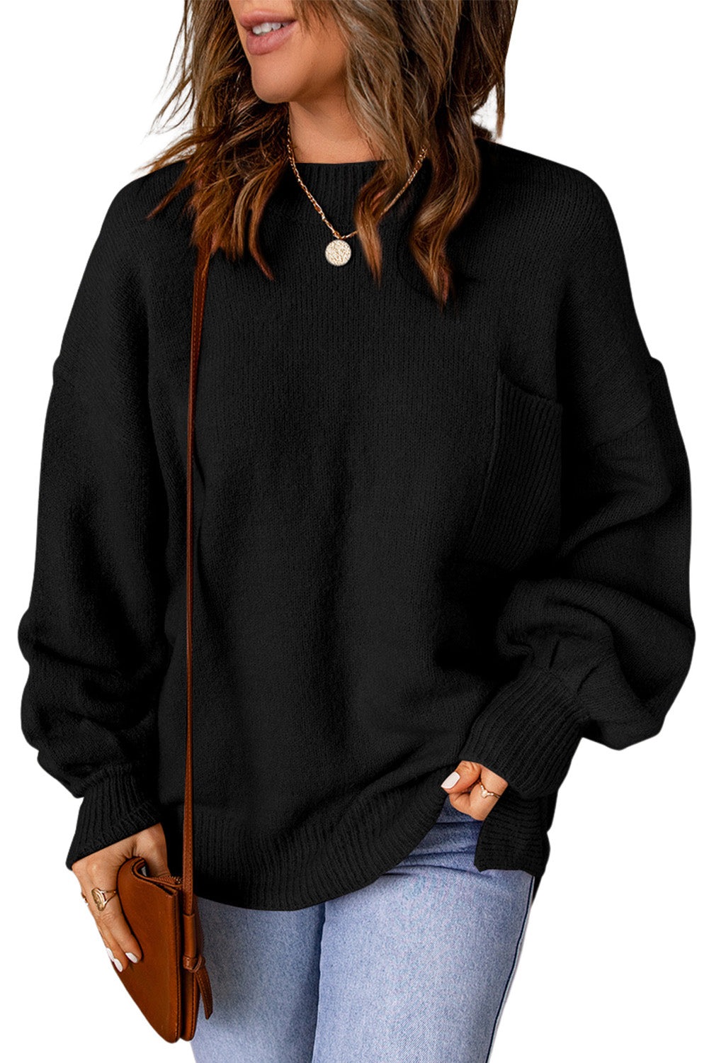 Crni jednobojni pulover s džepovima s puf rukavima