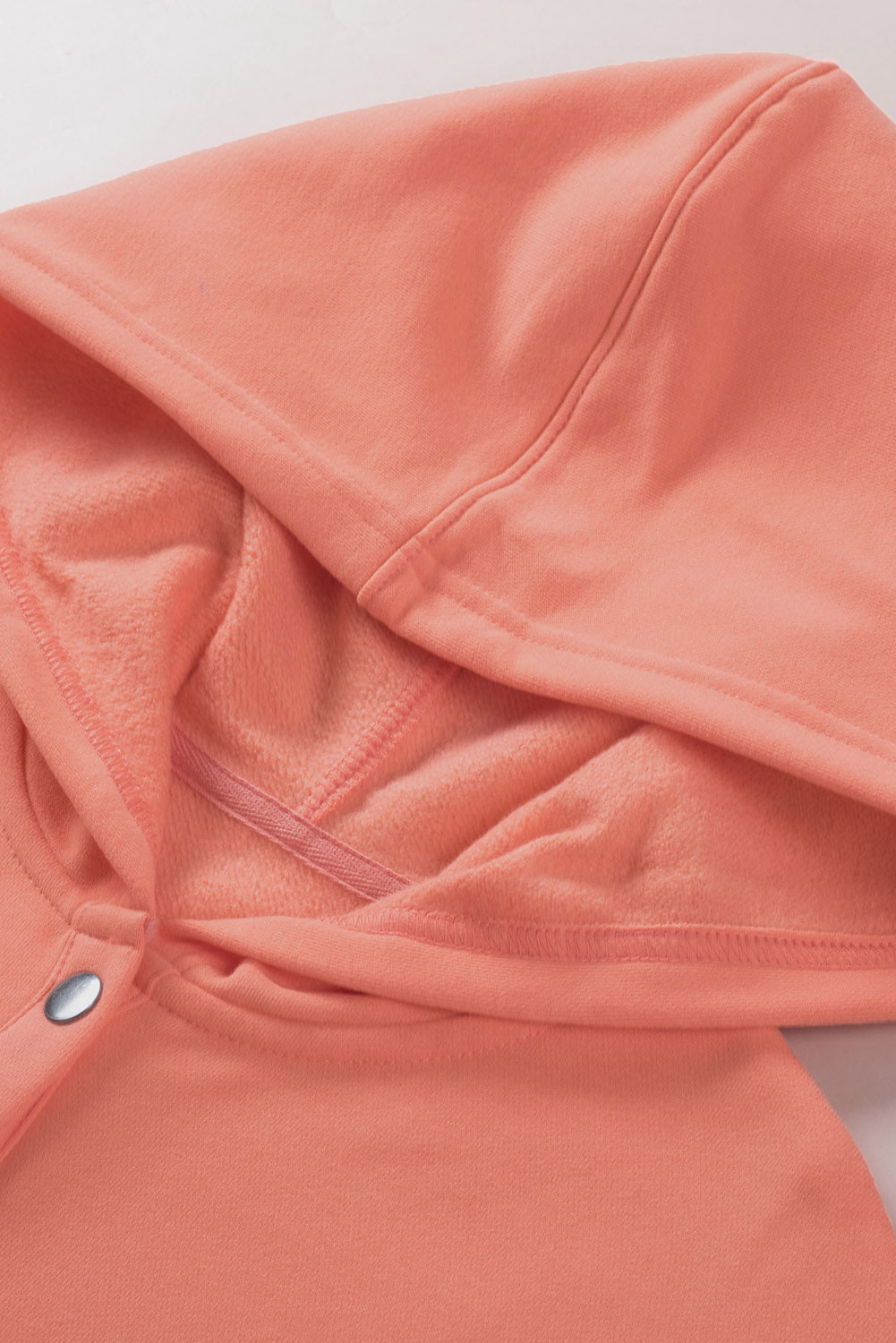 Orangefarbener Henley-Hoodie mit Fledermausärmeln und Taschen