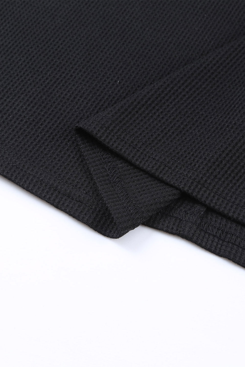 Haut noir à manches volantées et imprimé animal en tricot gaufré de grande taille