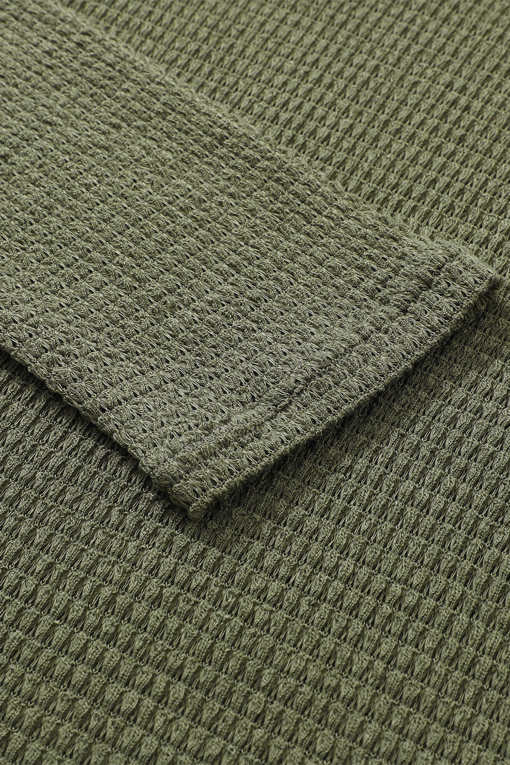 Haut oversize gris en tricot gaufré à fentes hautes