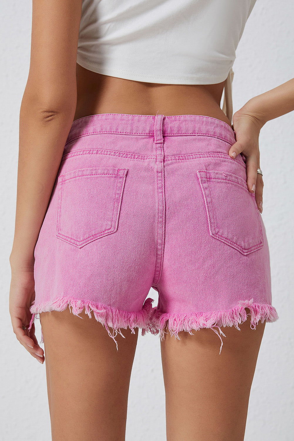 Rožnate kratke hlače iz džinsa z visokim pasom