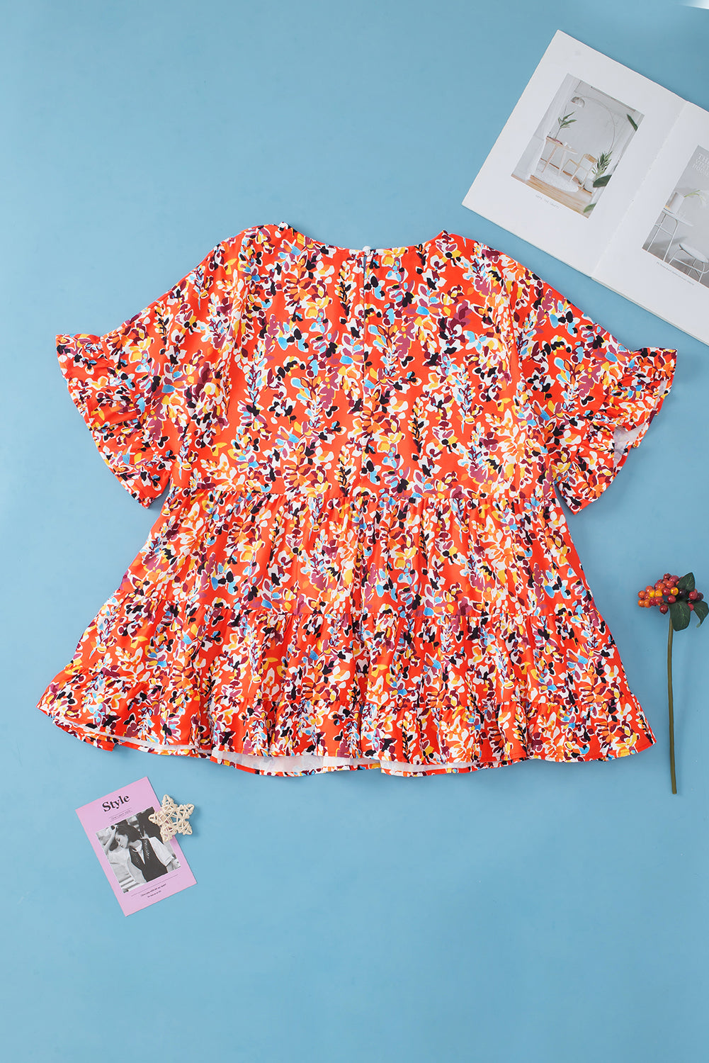 Orangefarbene, kurvige Babydoll-Bluse mit Blumenmuster und Rüschenärmeln
