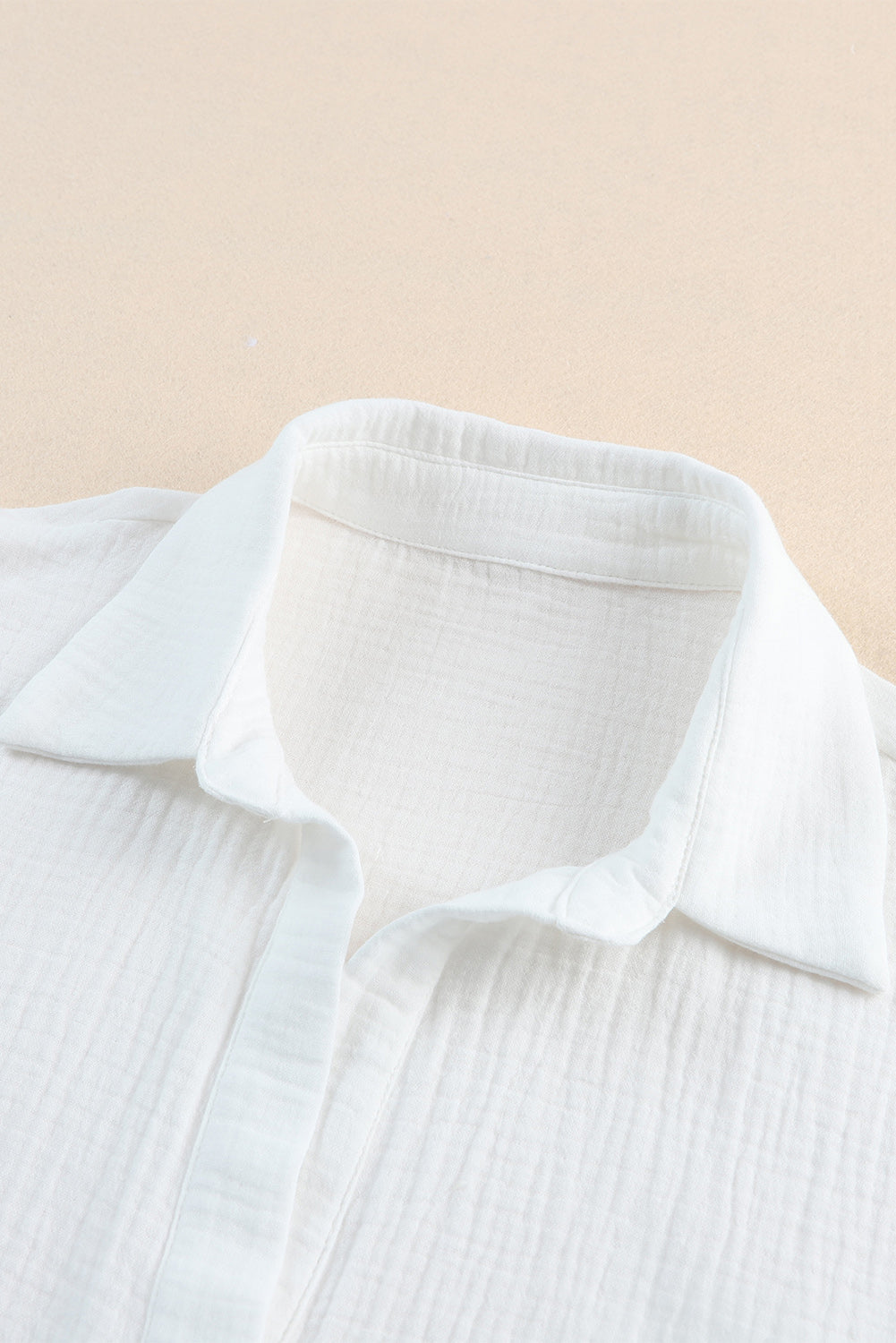 Camicia a mezza manica con bottoni annodata testurizzata bianca