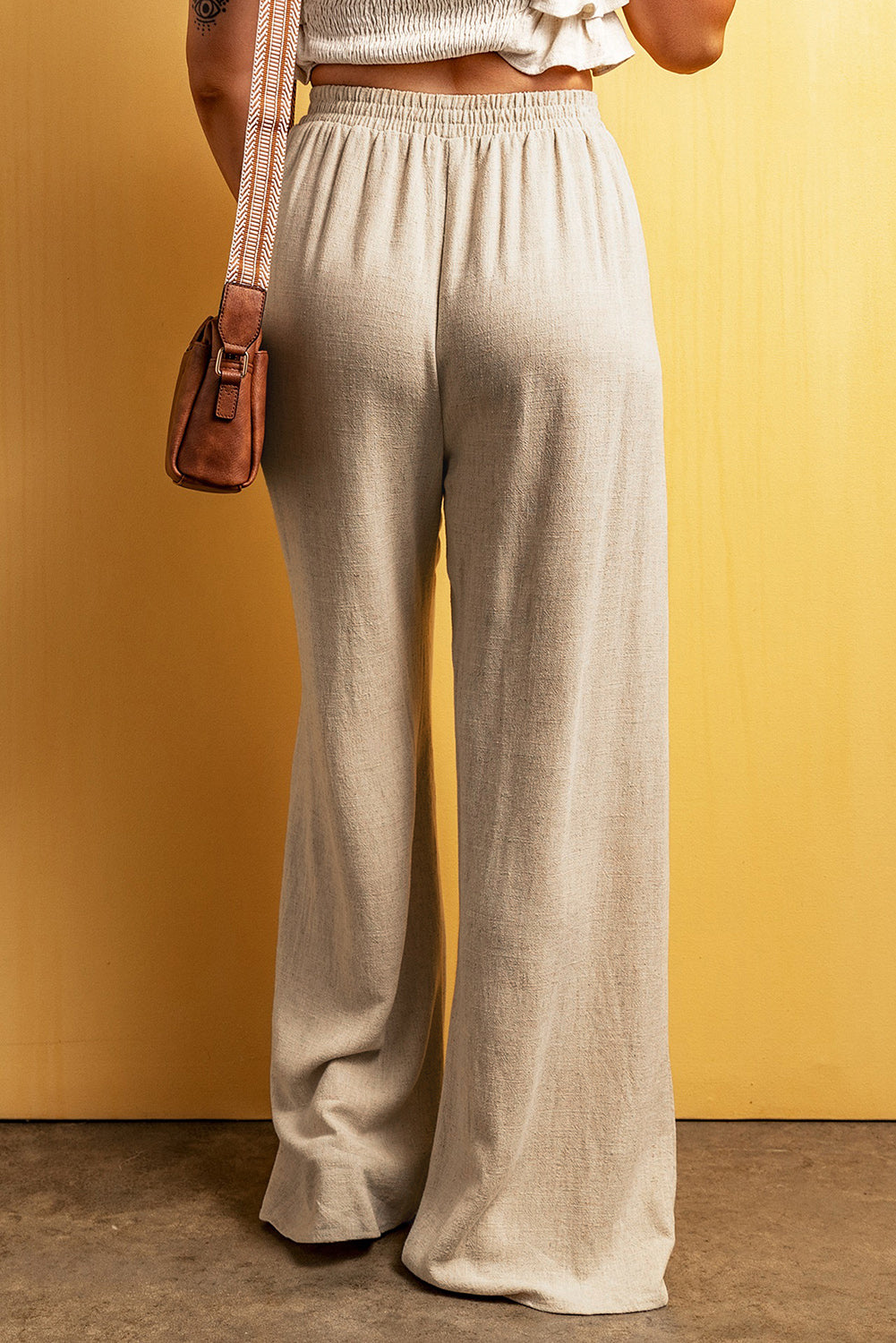 Pantaloni casual a gamba larga con lunghezza al pavimento in vita con lacci color albicocca