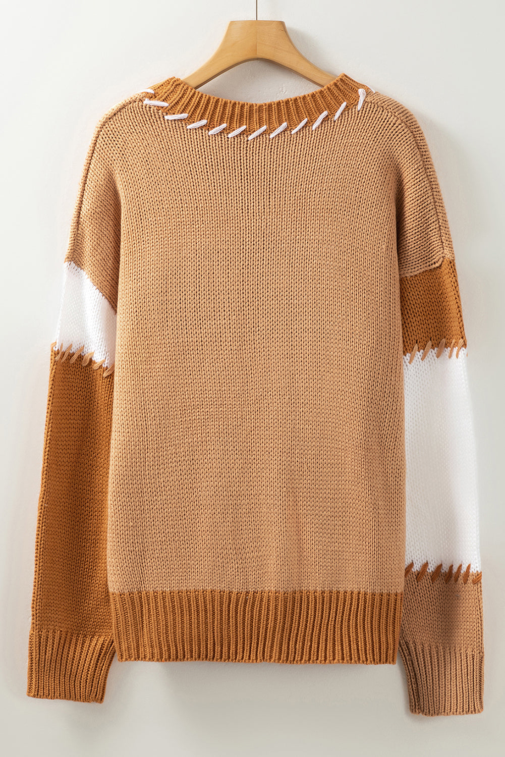 Prevelik pulover s kontrastnimi šivi v svetlem francoskem bež barvnem bloku