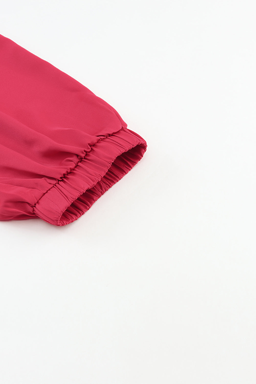 Pantaloni in vita elastica con coulisse e tasca in raso rosa