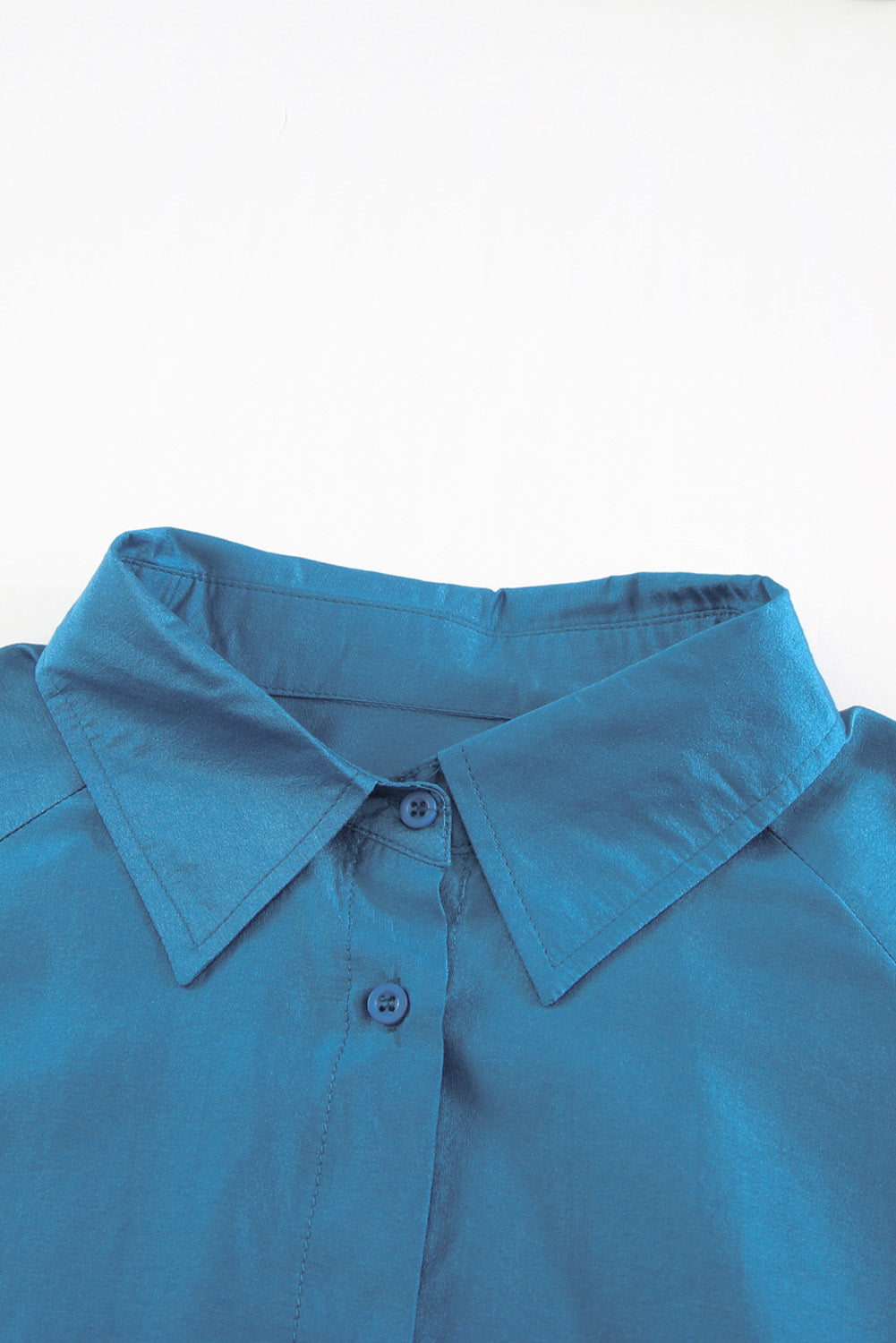Blaues Hemd mit bauschigen Ärmeln und Taschen