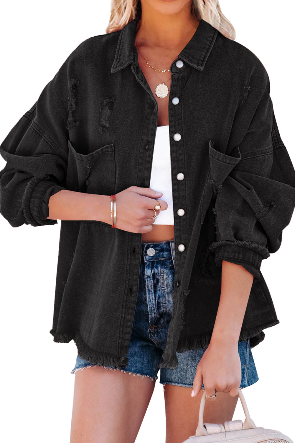 Schwarze Jeansjacke im Distressed-Look mit Fransenbesatz