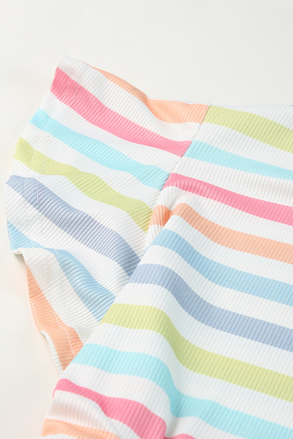 Camicetta babydoll in maglia testurizzata con stampa a righe multicolori