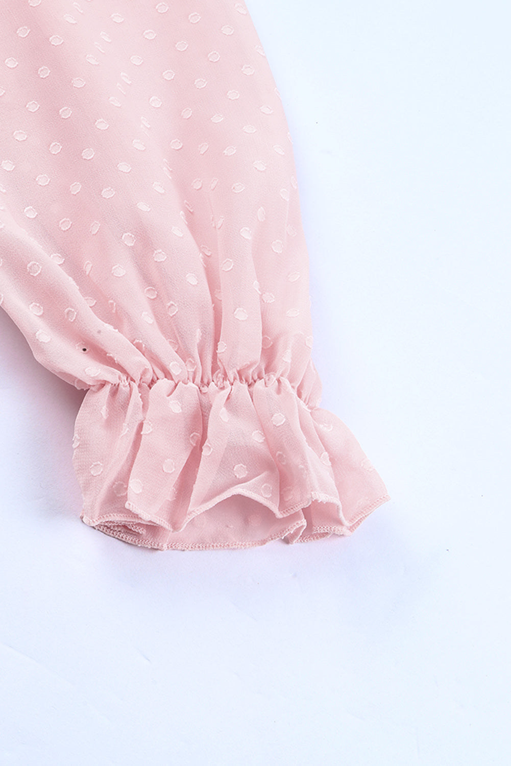 Mini abito svizzero a pois con maniche a sbuffo aperte sul retro con volant a strati rosa