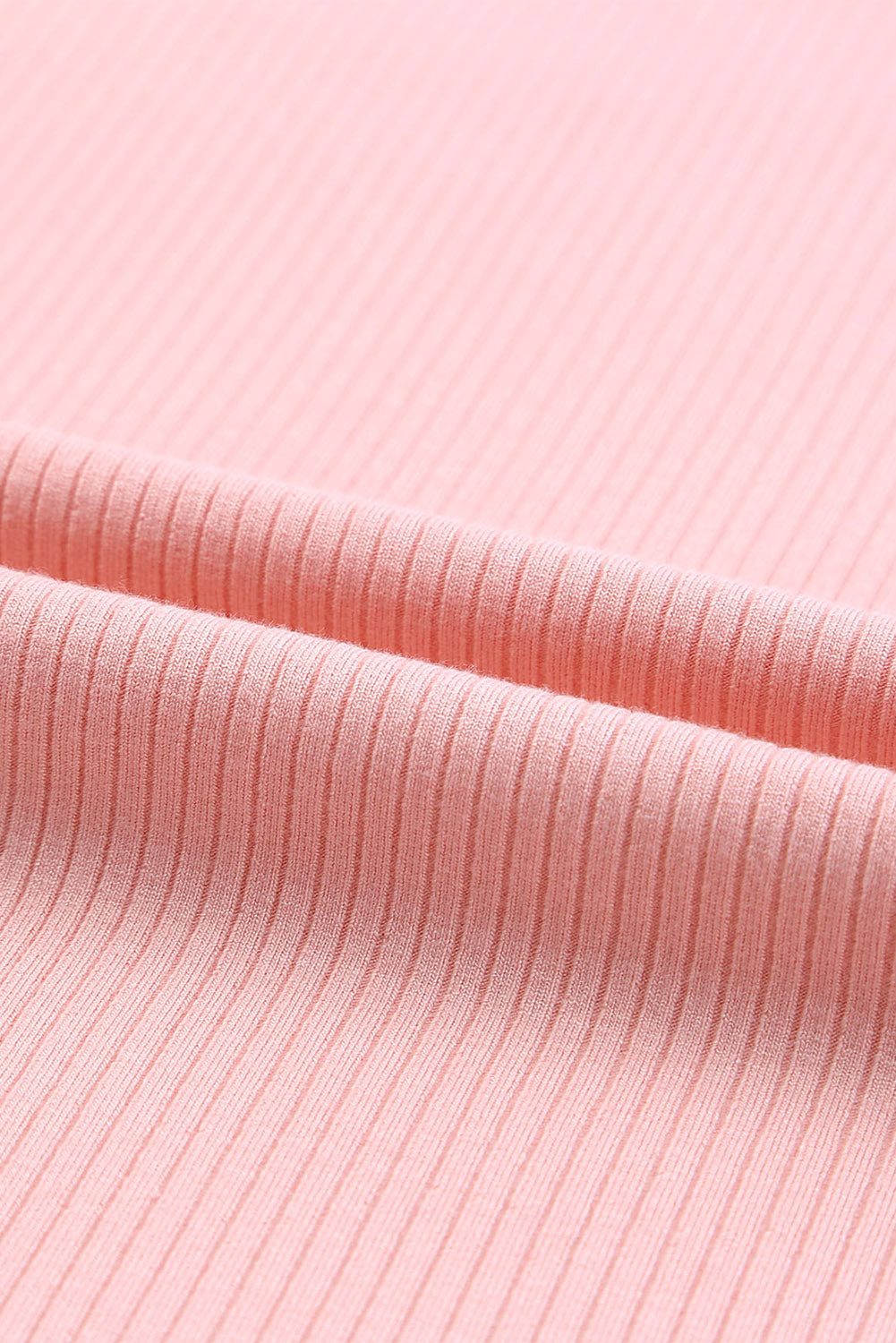 Haut en tricot côtelé rose à manches volantées en maille à pois