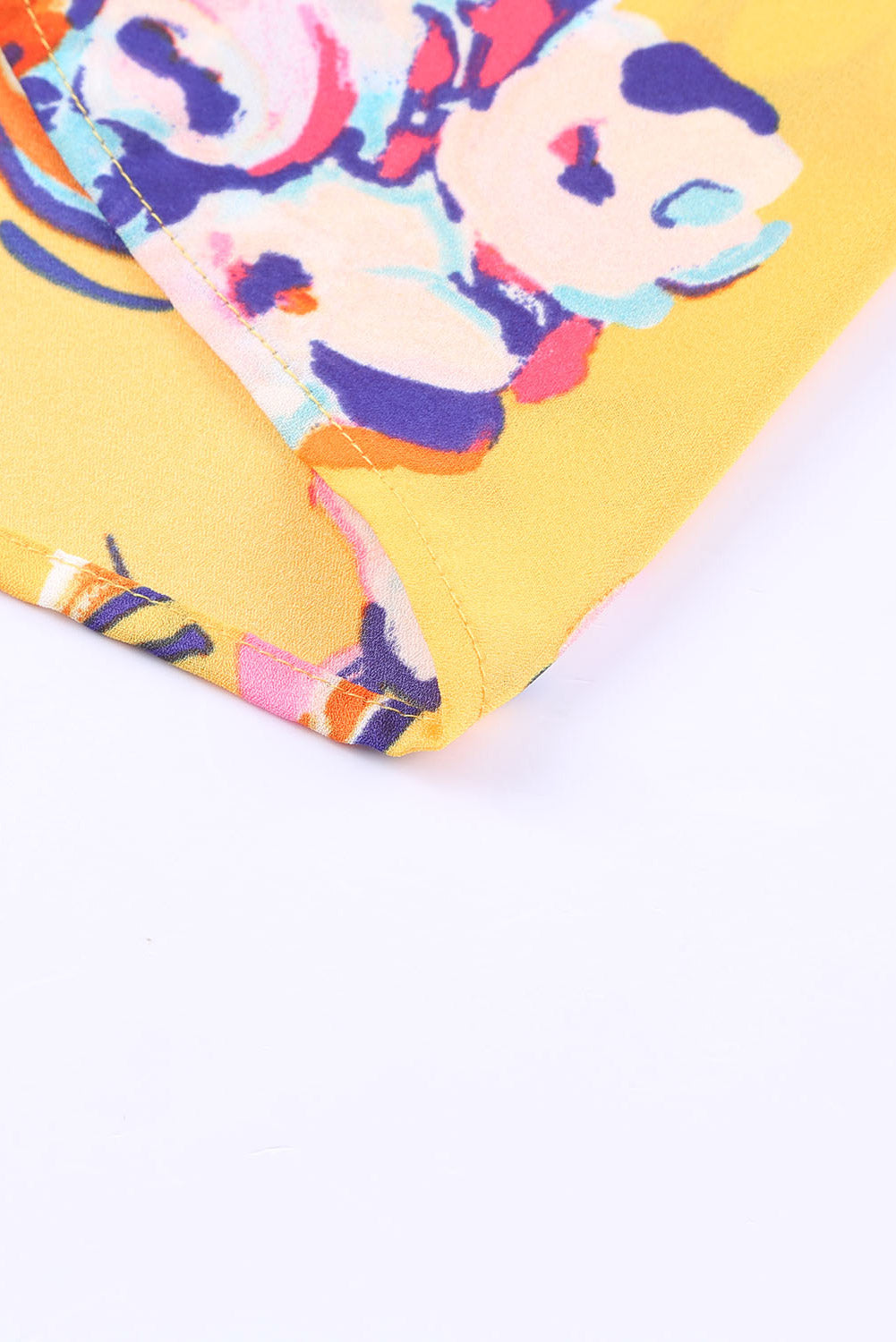 Gelbe Bluse mit Blumendruck und elastischem Ausschnitt