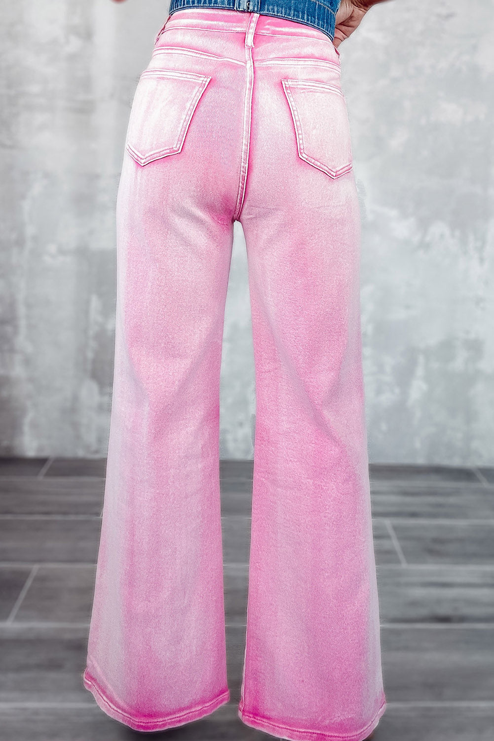 Jeans a gamba larga con ritaglio di strass a vita alta rosa
