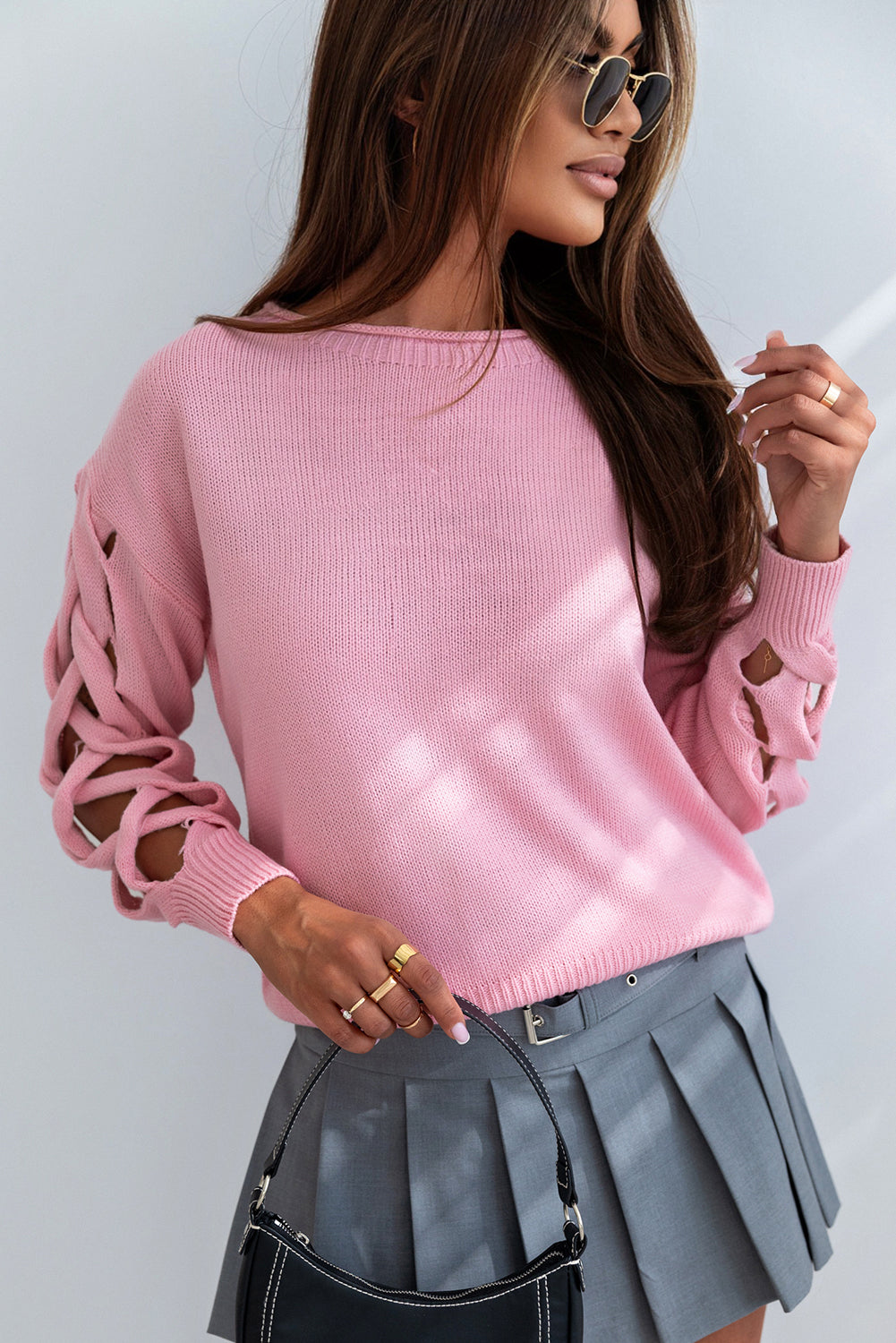 Rosa gewebter, ausgehöhlter Pullover mit abfallenden Ärmeln