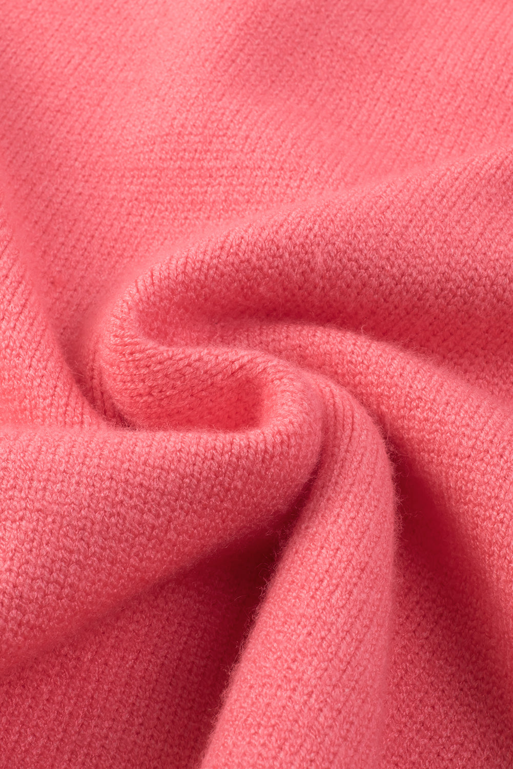 Ružičasti pulover s V izrezom spuštenih ramena veće veličine