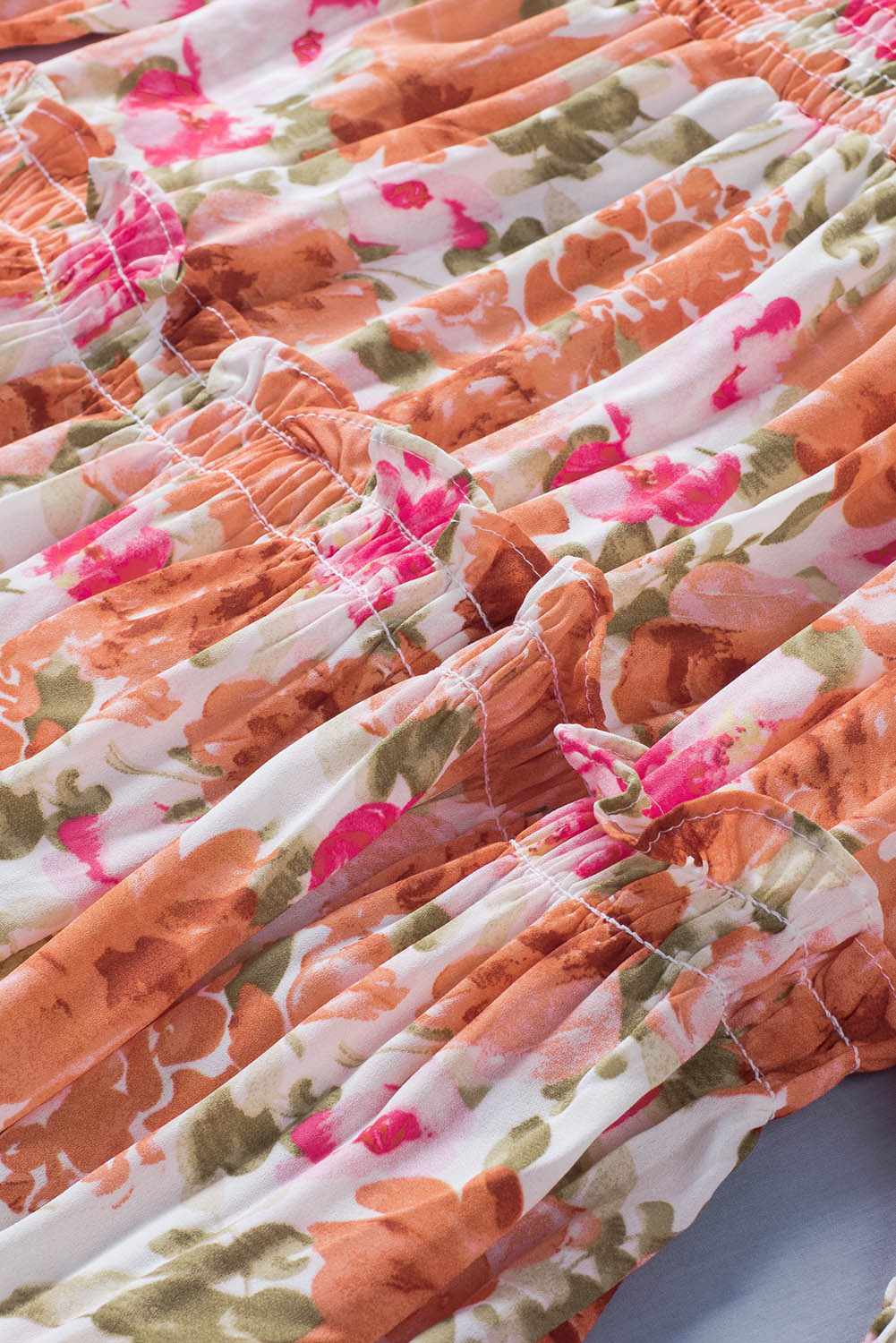 Mini-robe florale multicolore à col en V, manches longues et taille nouée