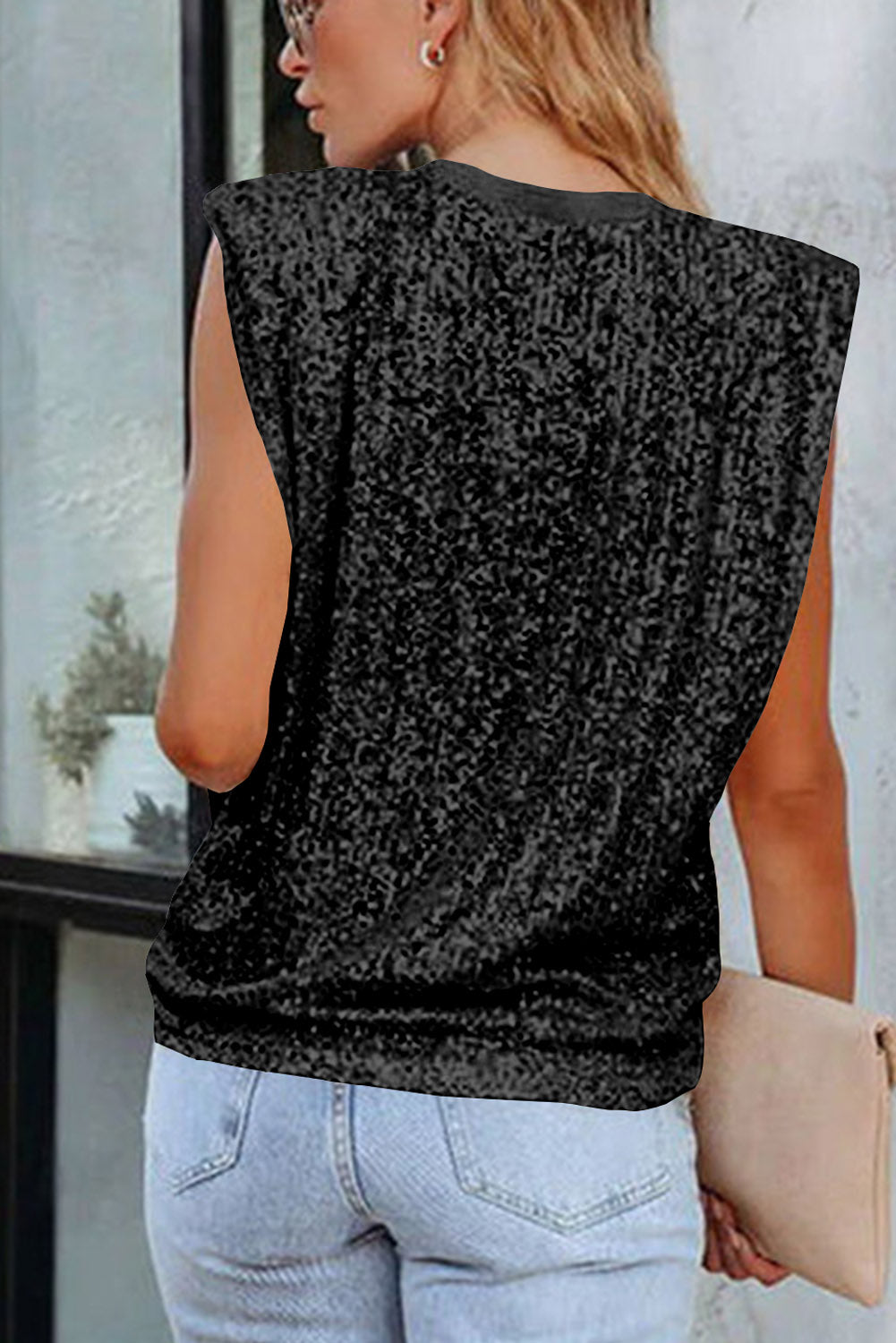 Majica s okruglim izrezom u boji crne marelice i šljokicama