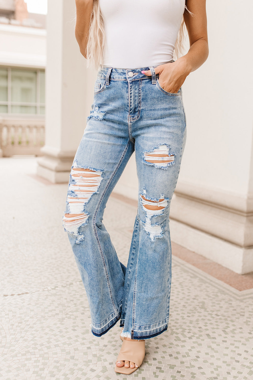 Jeans svasati a vita alta effetto vissuto lavaggio chiaro azzurro