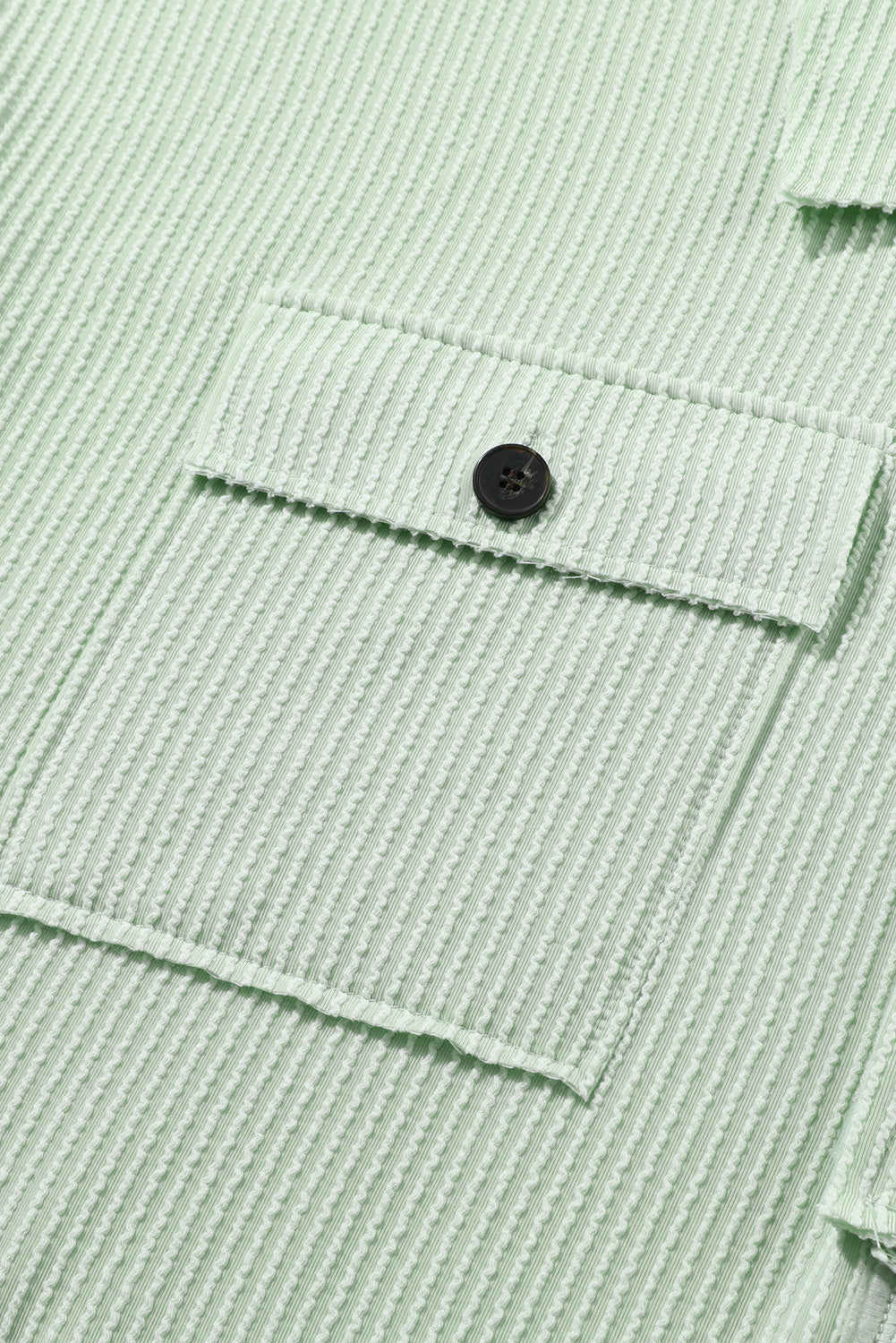 Grünes Henley-Oberteil mit gerippten Taschen und langen Ärmeln in Übergröße