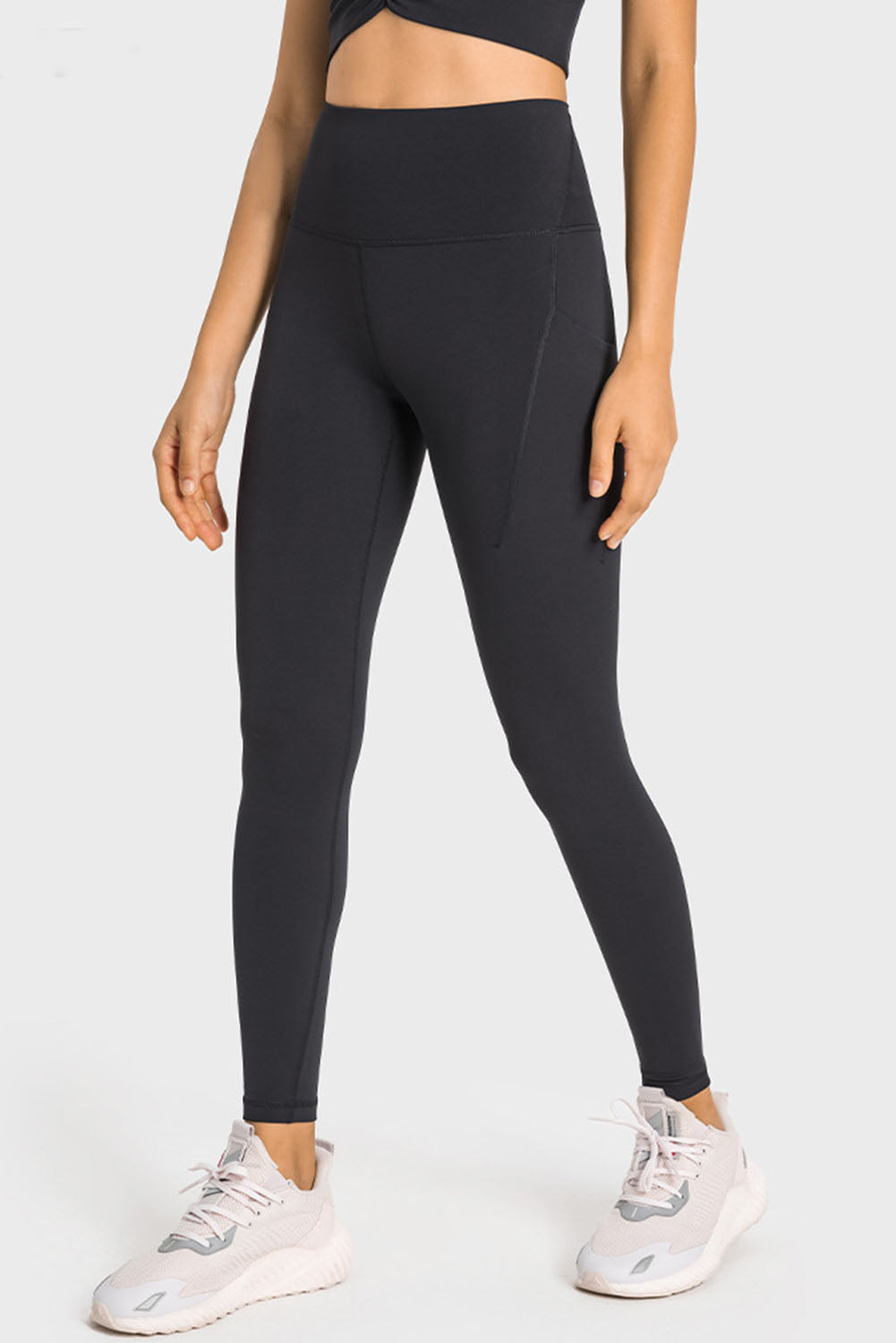 Schwarze Fitness-Leggings mit hoher Taille und Taschen