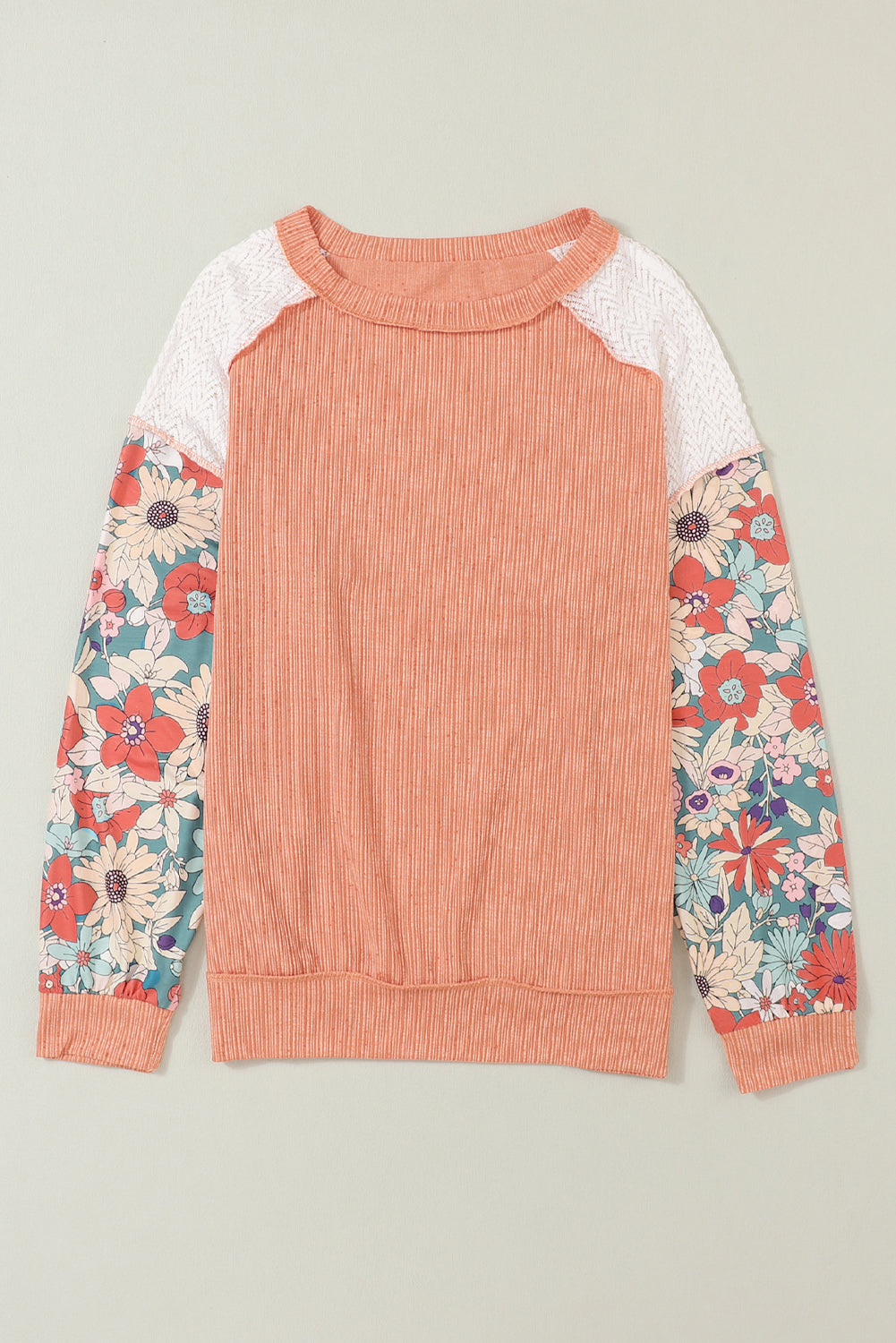 Rjava teksturirana bluza z napihnjenimi rokavi in ​​cvetličnimi motivi