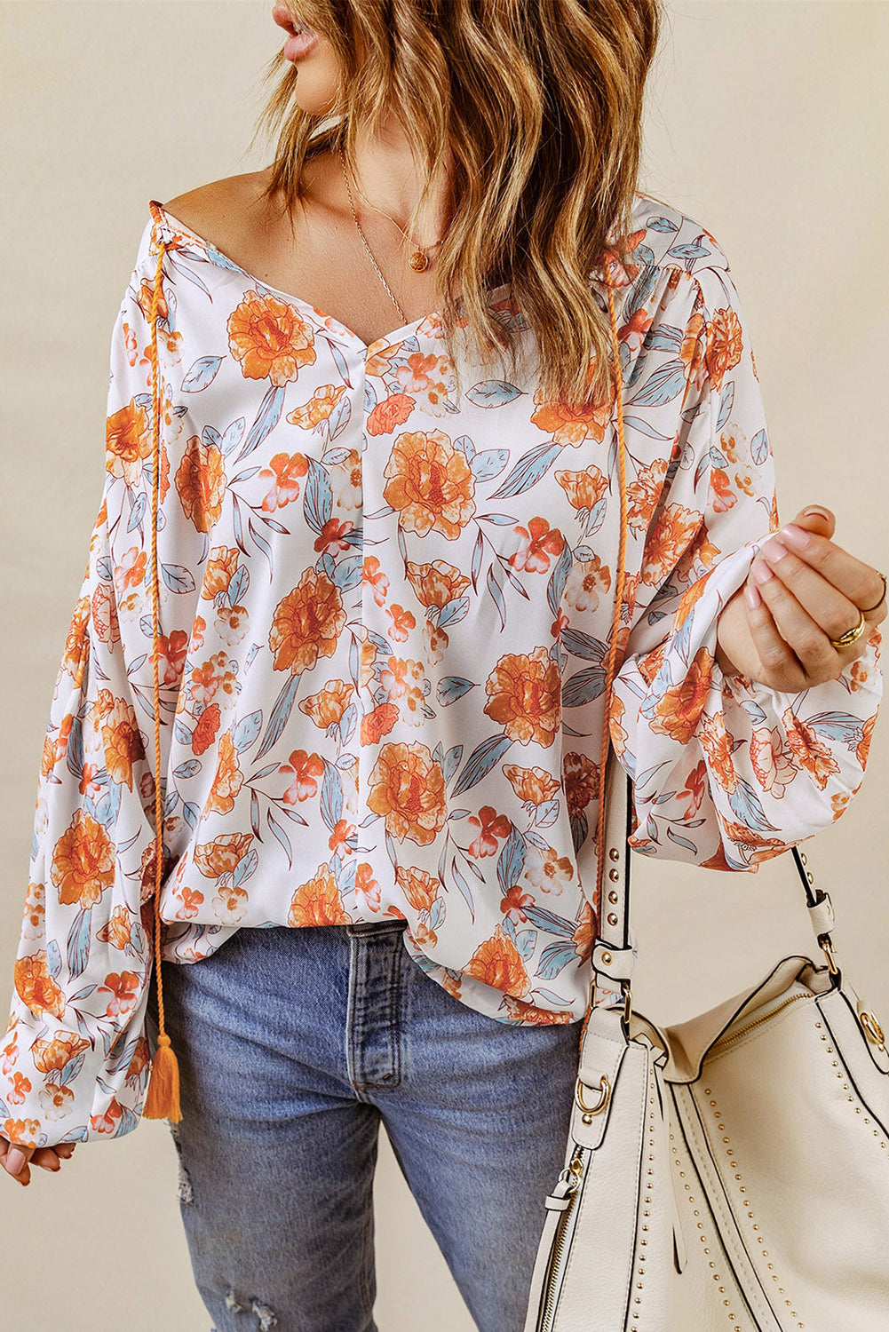 Narančasta bluza s V izrezom i cvjetnim uzorkom Dolman