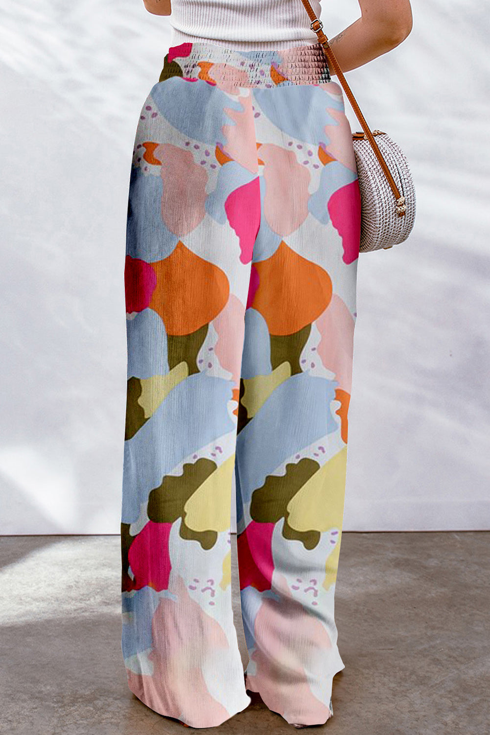 Fließende Hose mit weitem Bein und mehrfarbigem Farbpaletten-Print