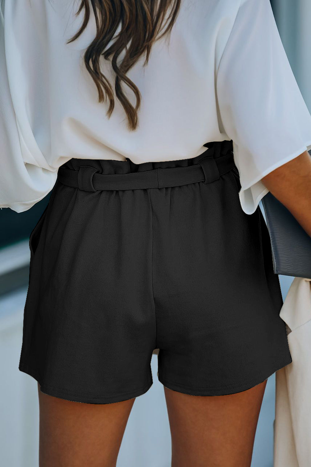 Črne pletene kratke hlače z žepi iz mešanice bombaža