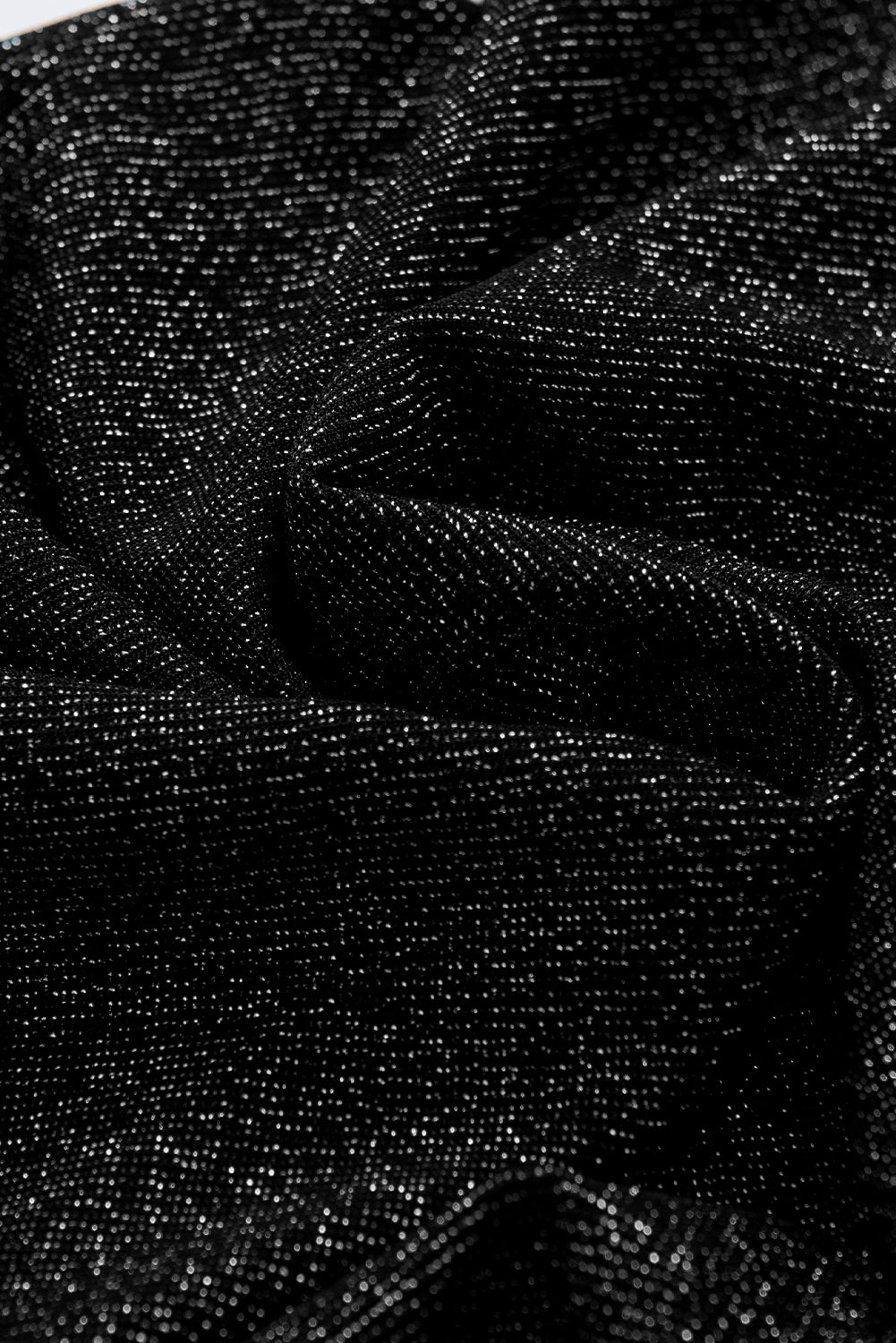 Top slim fit in maglia metallizzata nera con maniche a gigot