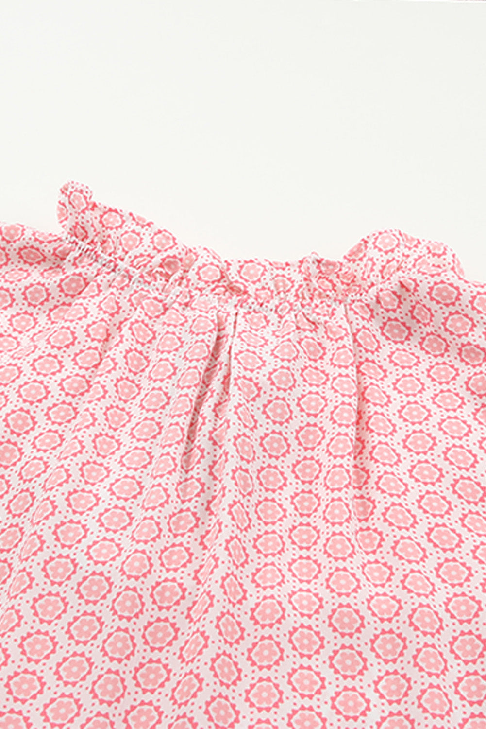 Maxi obleka brez rokavov z rožnatim abstraktnim potiskom in razcepljenim ovratnikom