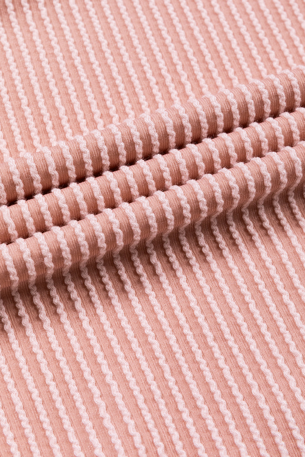 Top ampio a coste a maniche lunghe color block rosa