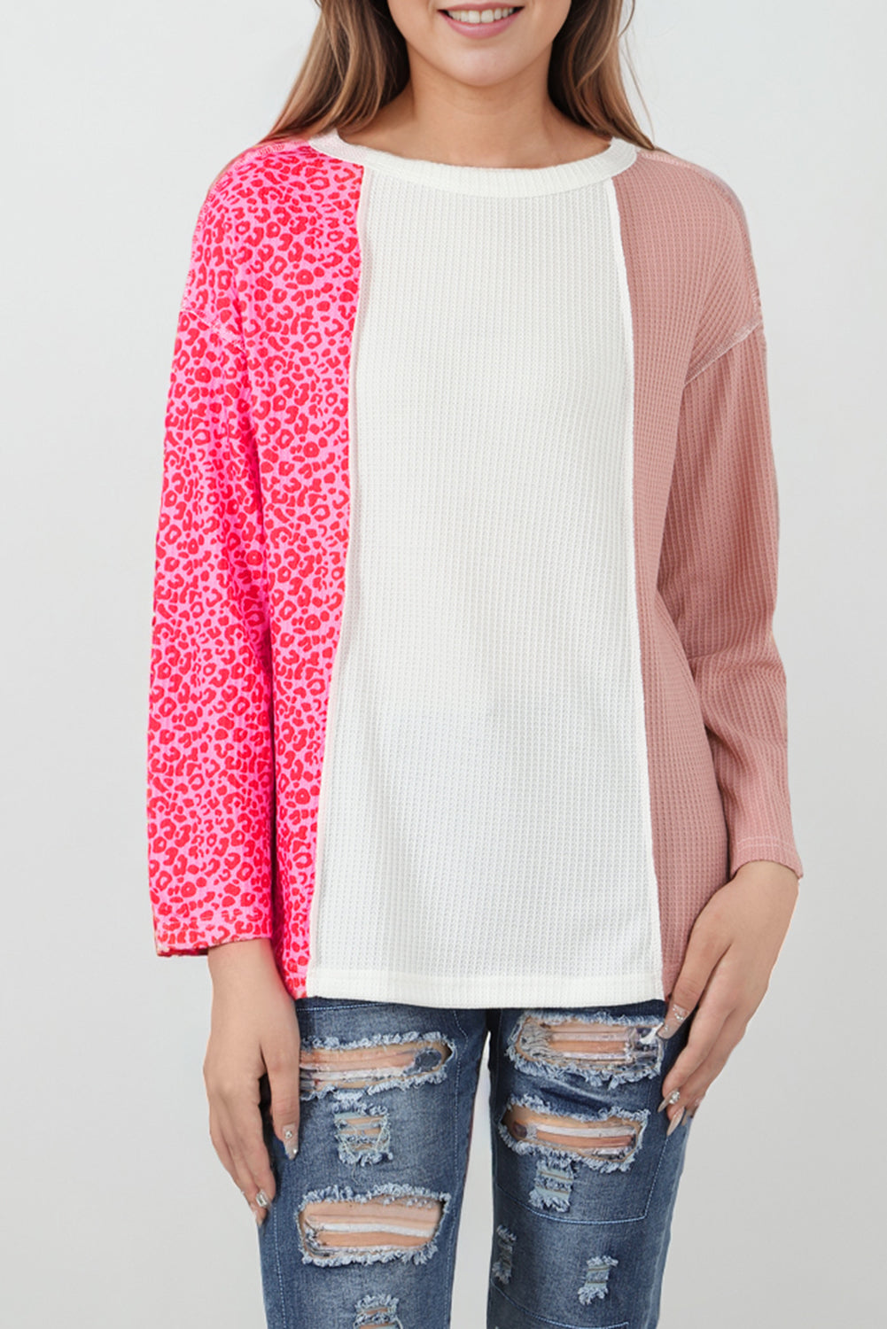 Haut rose à imprimé color block léopard et coutures apparentes en tricot gaufré