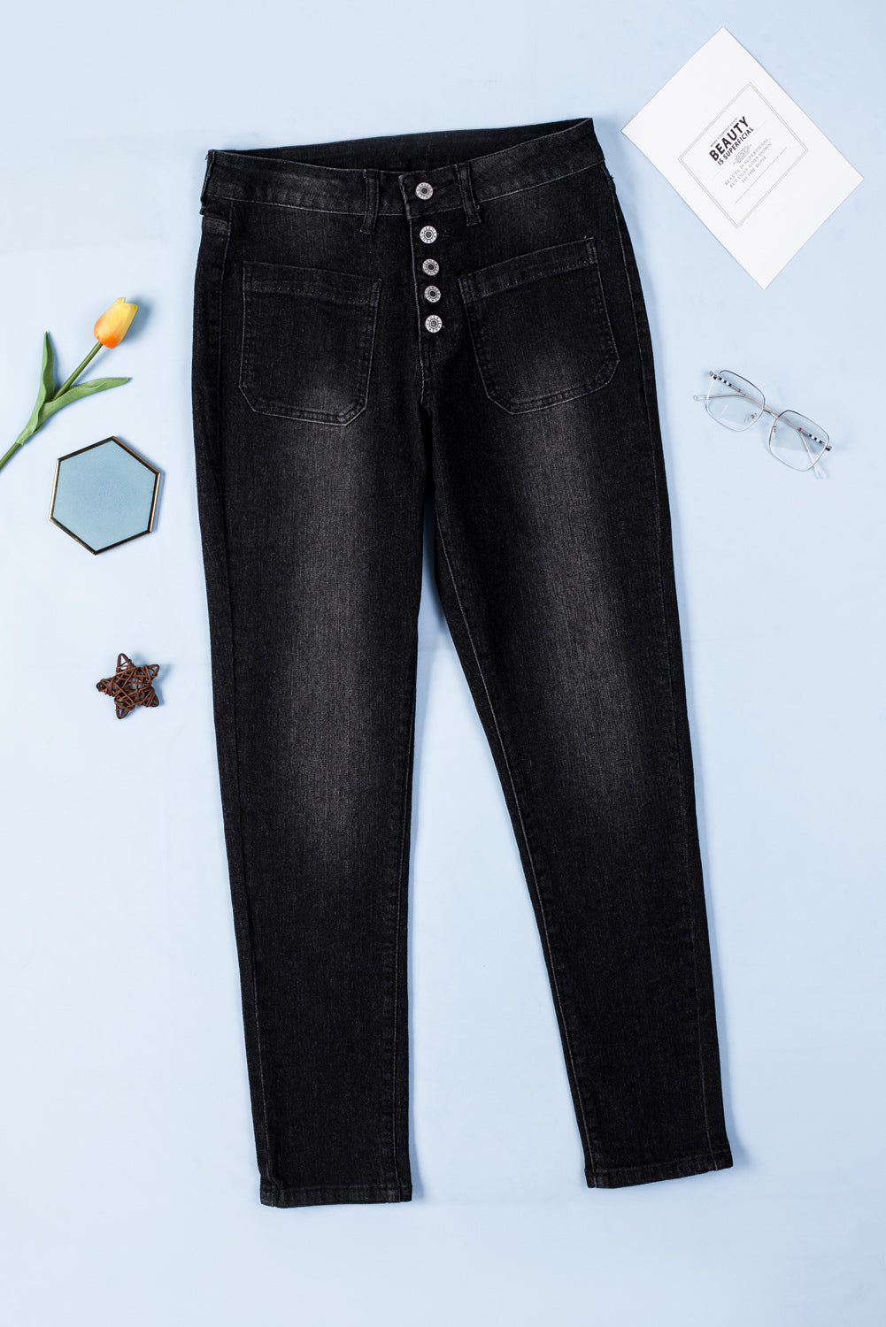 Jean skinny bleu clair avec braguette boutonnée et poches