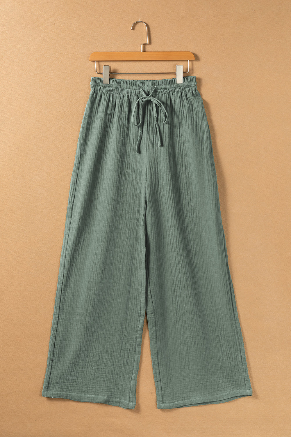 Set di pantaloni larghi con coulisse e collo diviso in piega verde