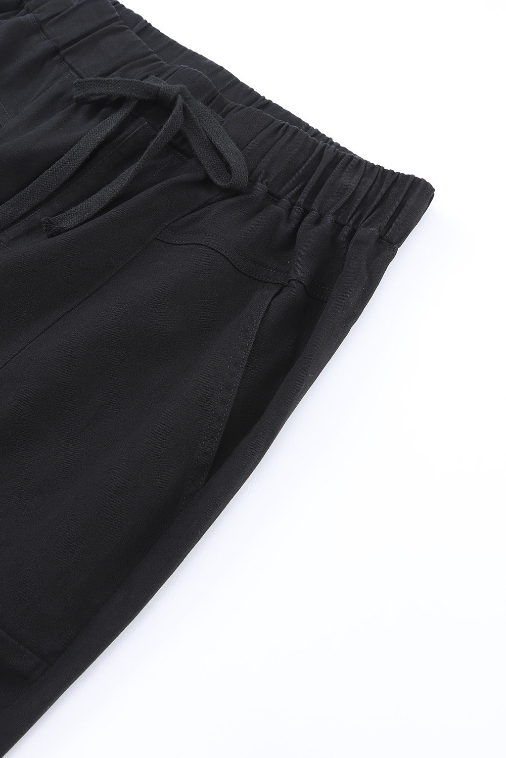 Pantalon noir taille haute avec poches et cordon de serrage
