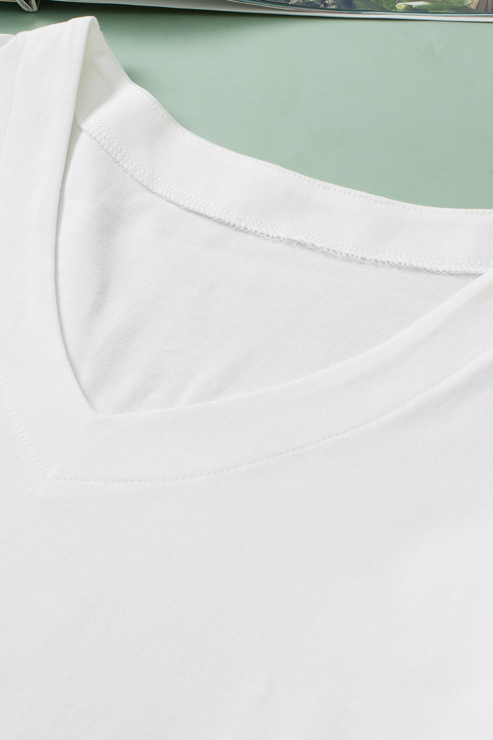 Weiße, bestickte Patchwork-Bluse mit Puffärmeln und V-Ausschnitt