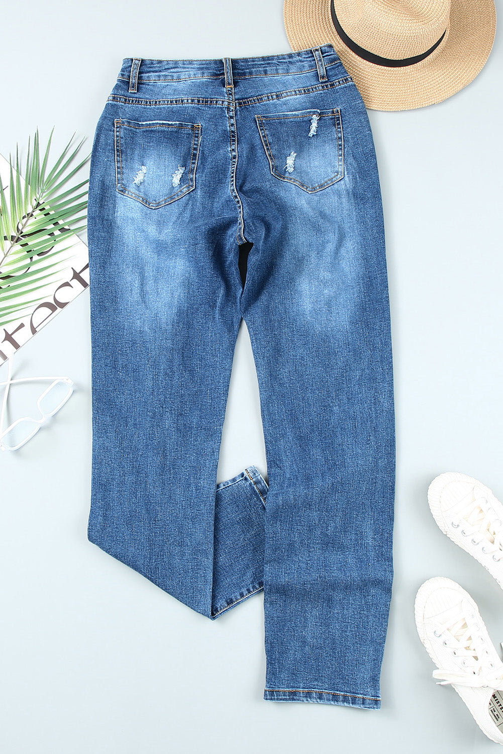 Himmelblaue Distressed-Jeans mit geknöpften Taschen