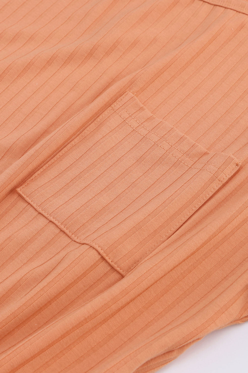 Langärmliger Strampler in Orange mit geripptem Kordelzug an der Taille