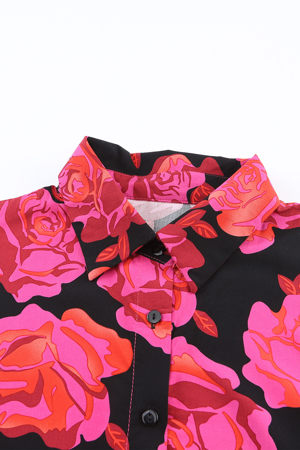 Chemise à manches longues et poignets froncés à fleurs roses