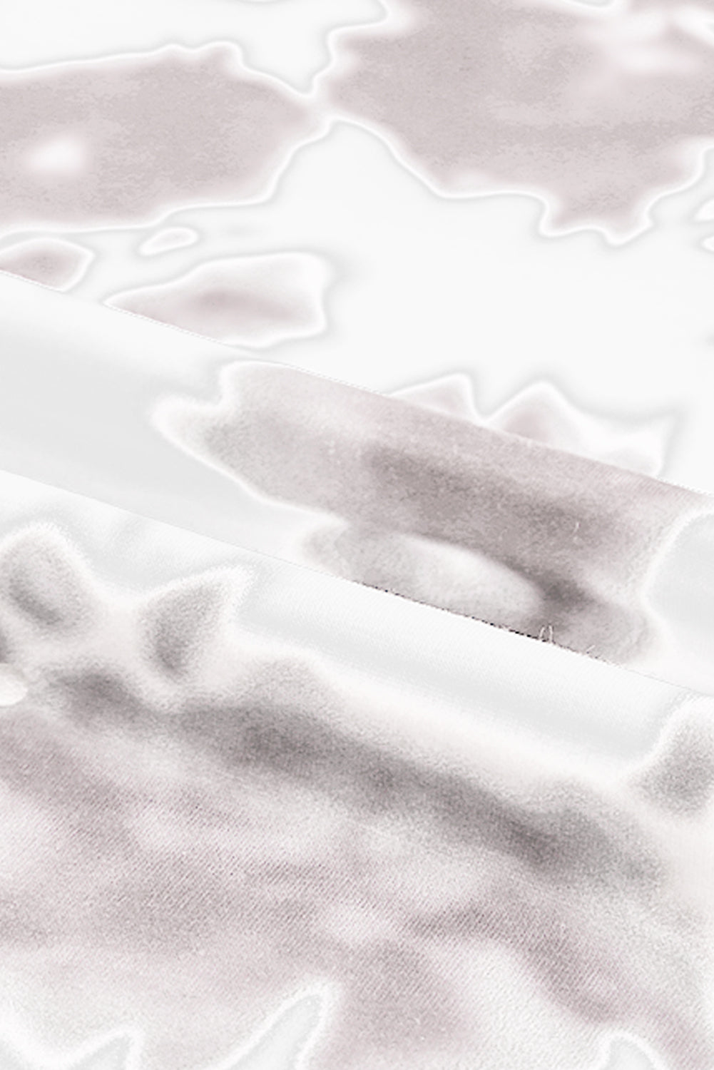 Top bianco a maniche corte con scollo rotondo e tintura in tie-dye