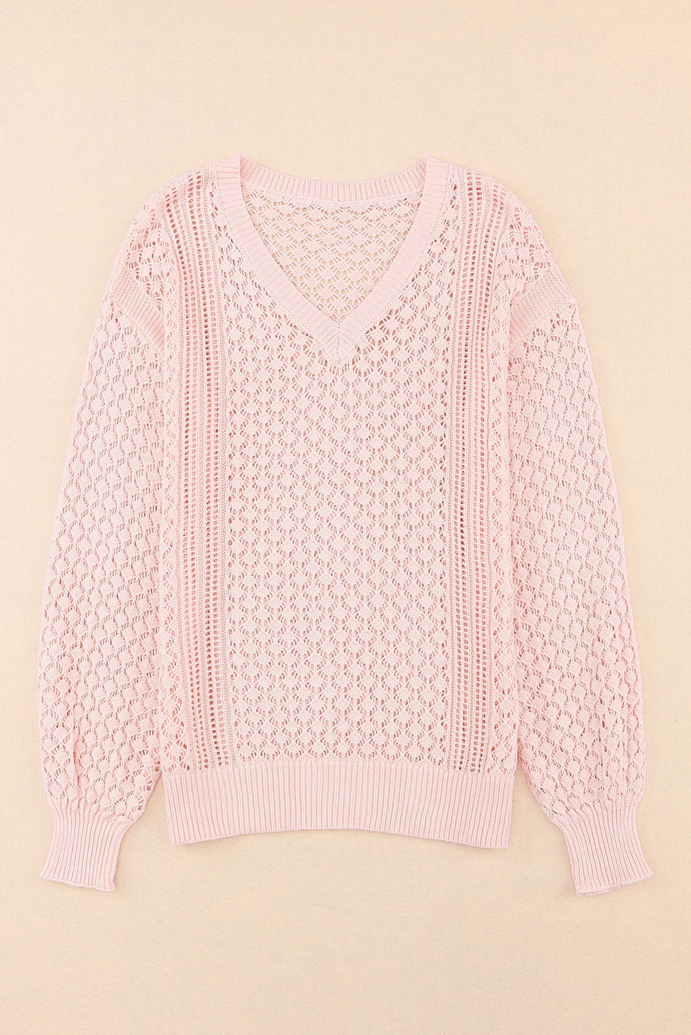 Rožnat ohlapen pleten pulover z rebrastim v-izrezom