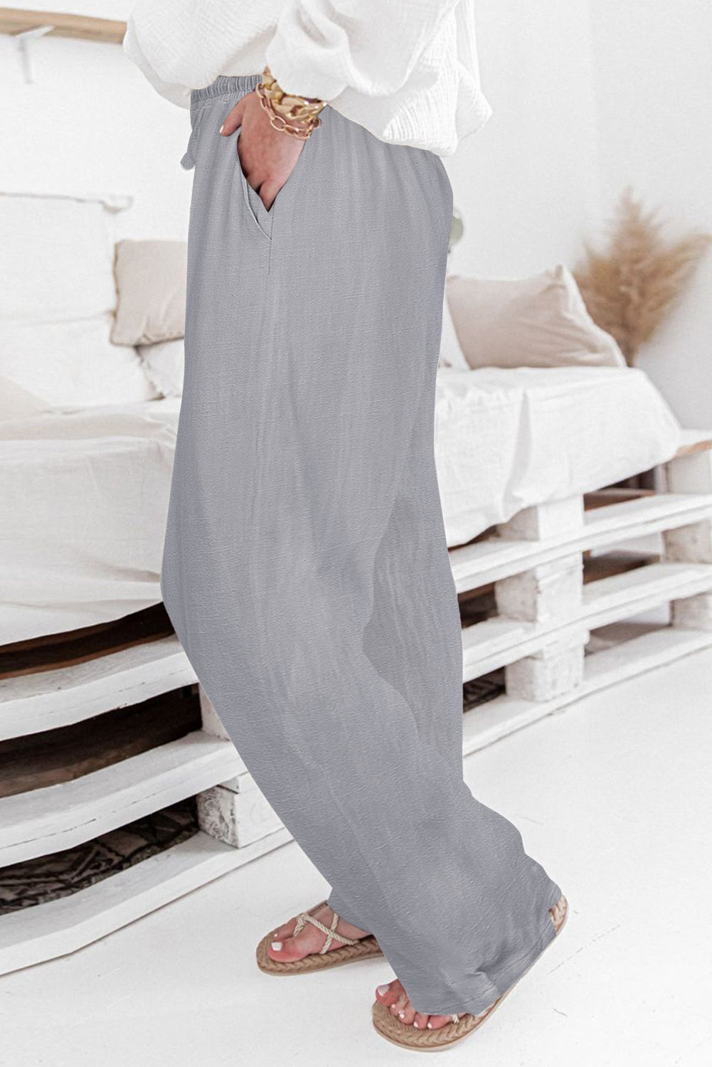 Sive ležerne hlače širokih nogavica s visokim strukom